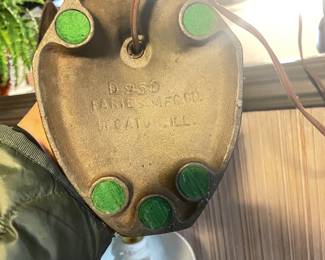 Additional view of bottom of cast iron lamp ~