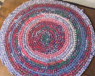 Blue, red, green  handmade rug,  Approx 24"-30" diameter, $10