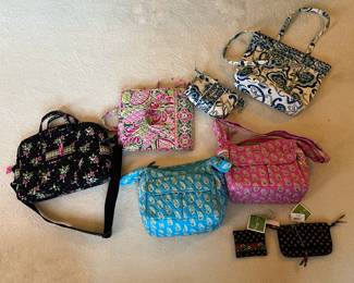 Lots of Vera Bradley Bags/Wallets/Cases and More, only a fraction pictured. Lots with tags still on, brand new!!