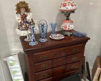 Dresser, dolls, collectible glass, lamp