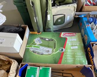 Pup tents and Coleman Stove used once, tons of camping stuff and sleeping bags