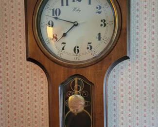 Wall "cross" looking clock