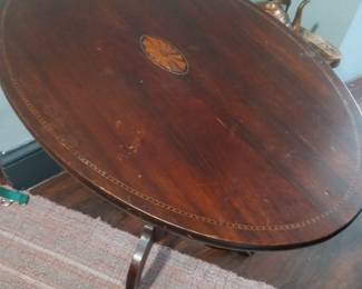 tilt top Mahogany English table 175.00