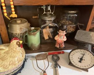 Notice the attached jar on right side of Hoosier cabinet as well as the green pitcher