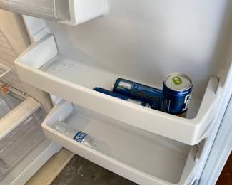 Hotpoint refrigerator - smaller size but works great - outer door shelves. 