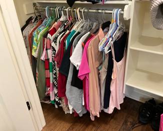 Lots of clothing in both bedroom closets - range from 12-16 or Medium to X-large 