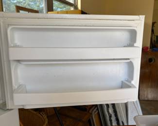Hotpoint refrigerator - smaller size but works great - inside door to freezer