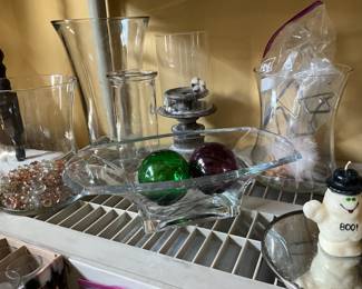 Miscellaneous glass items plus the “Boo” candle
