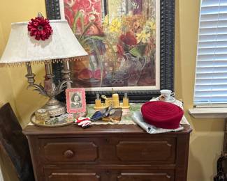 Chest, lamp, dresser set, powder box on tray, vintage cup/saucer set & vintage hat.  Framed picture not for sale.