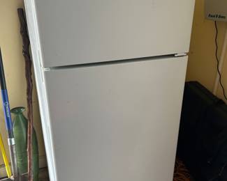 Small refrigerator in garage 