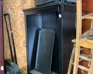 TV cabinet, luggage in garage 