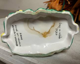 Markings on bottom of scarecrow - “Garnier Liqueure “  also Marked made in Germany