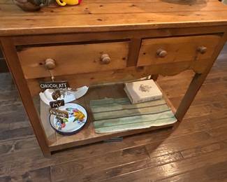 Chocolate my friend sign n table drawer pull, plates & miscellaneous on shelf at bottom of previous table