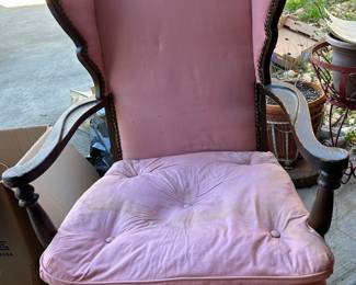 Pink upholstered vintage chair with nailhead trim 