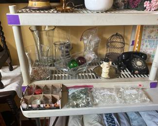 Bedroom on left - candles, more vases, vintage telephone, clear glass beads, wire cage 