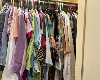 Lots of clothing in both bedroom closets - range from 12-16 or Medium to X-large 