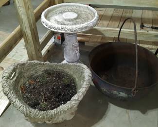 Vintage cement birdbath, planter, and cast iron cauldron