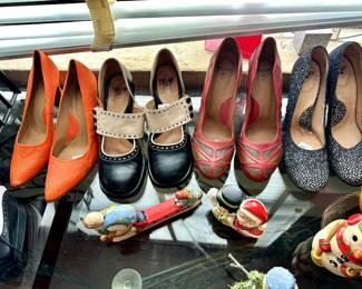 Women's designer shoes, many John Fluevog in larger sizes.... hang on for deets
