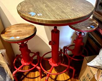 Industrial & Funky! Two stools at $95 each, one high top table at $275