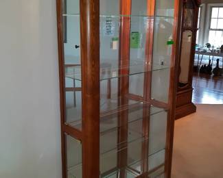 Oak lighted curio cabinet