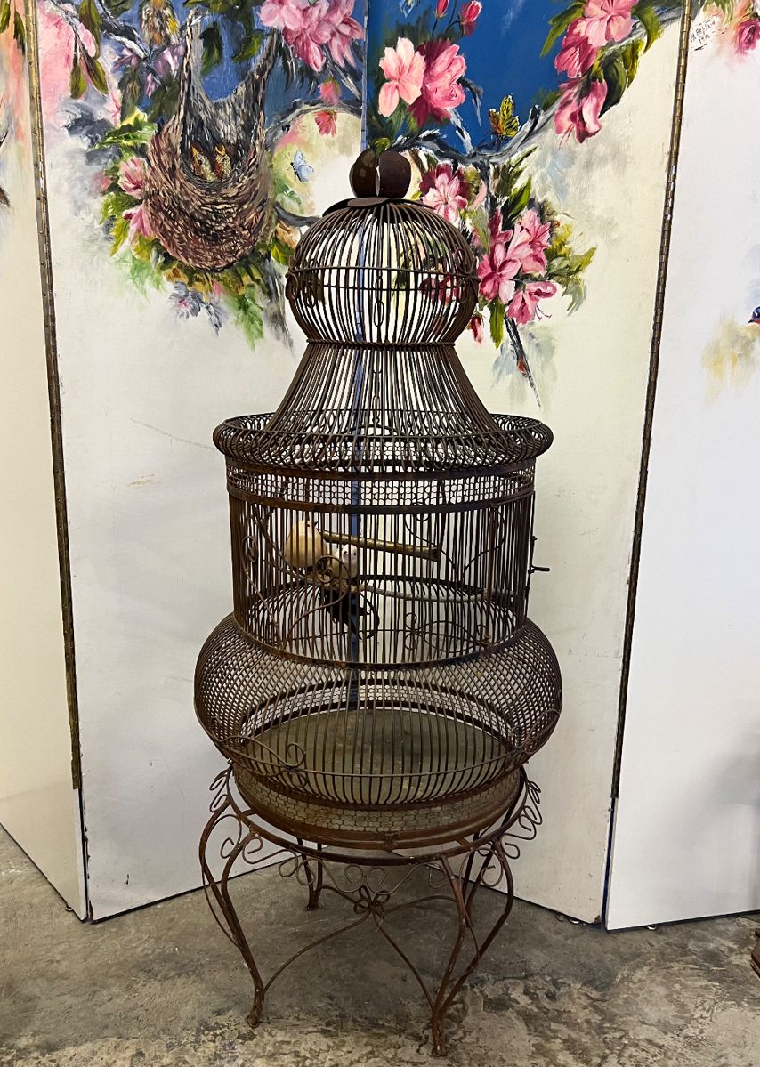 Metal birdcage on stand