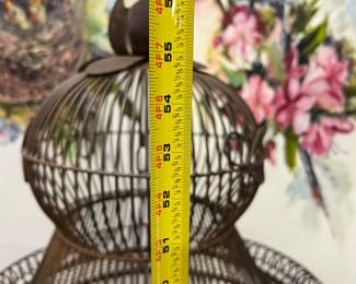 Birdcage measures 56 inches tall on stand.