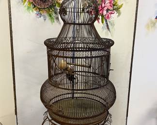Metal birdcage on stand