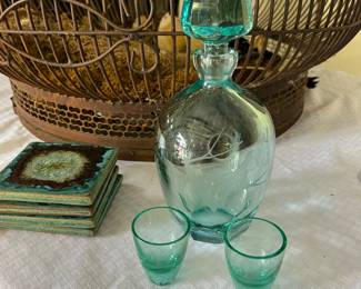 Teal decanter and shot glasses.