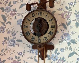 Wooden movement weighted wall clock
