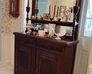 Side board , milk glass, sterling silver candle sticks, Staffordshire dog and cat