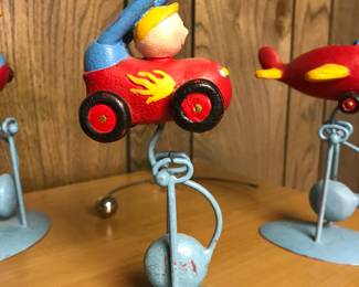 '50's counterweighted racecar and airplane