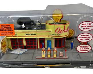 Menards Gold Line O Scale Building: Wally's Service Station Shell Oil Pre-Lit