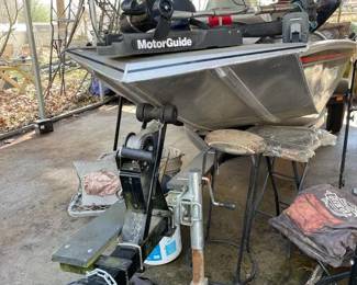 In Beautiful Condition BASS TRACKER BOAT AND TRAILER with MECURY OUT BOARD MOTOR