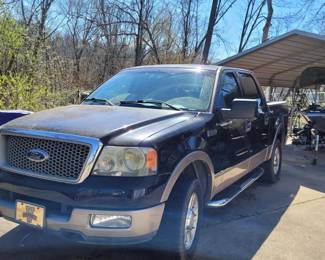 2004 Ford F150 Lariat 5.4 Triton 4 x 4 VIN #: 1FTPW14534KC01149 Black with White Trim, Tow Package, Side Steps and More! Offers begin at $4,000 with $200 minimum increments taking offers until noon on Saturday call for details . Call, Text or email for Details