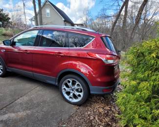 2015 Ford Escape Titanium Sport Utility 4D 4x4 Red with approx. 101,876 mi.  VIN 1FMCU9J92FUC40876 will sell by noon on Saturday to Highest and Best Offer. Offers begin at $8,200 with $200 minimum increments taking offers until noon on Saturday call for details Call, Text or email for Details