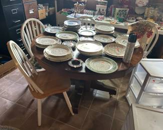 Round dining table and set of four chairs