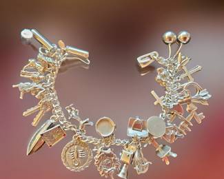 Sterling Charm Bracelet $149 or bid #36