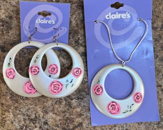 Claire's necklace and earrings.