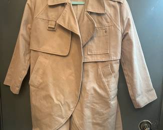 In & Out jacket. Feels like jean material. Not sure of size. 