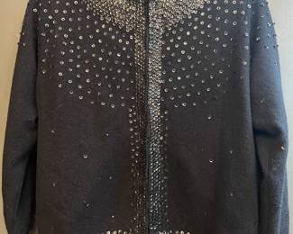 Black wool cardigan with beading sequins. Not sure on size. 