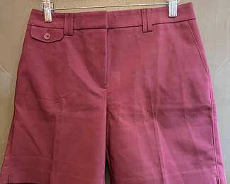 2 pairs of White House Black Market shorts. Both size 4.
Back pockets not function on both. Black and purple pair.