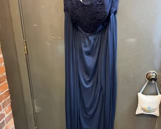 Navy blue David's Bridal dress. Size 16. Slit in front and zipper function in the back.