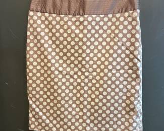The Limited brown and white pok-a-dot skirt. size 0. Small slit in back.