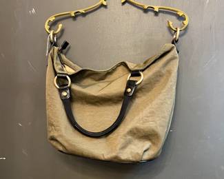 Ellington purse. Green and black. Stain on bottom. 