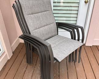 Stackable ourdorr chairs with table anad umbrella