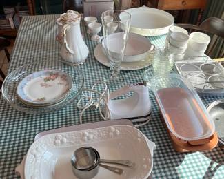 White enamel paella pans and baking items