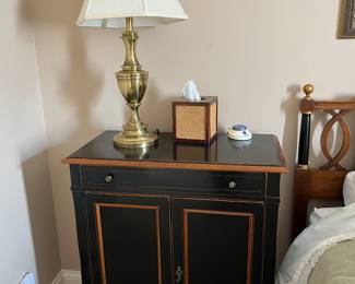 Pair black and wood bedside cabinets And pair brass lamps