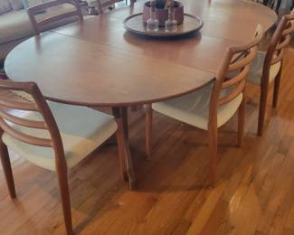 j.l. moller dining table and chairs 