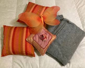 Decorative Pillows And Hand Knitted Throws