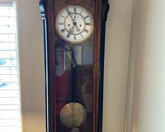 Eastlake Ebonized Grandmother pendulum clock.